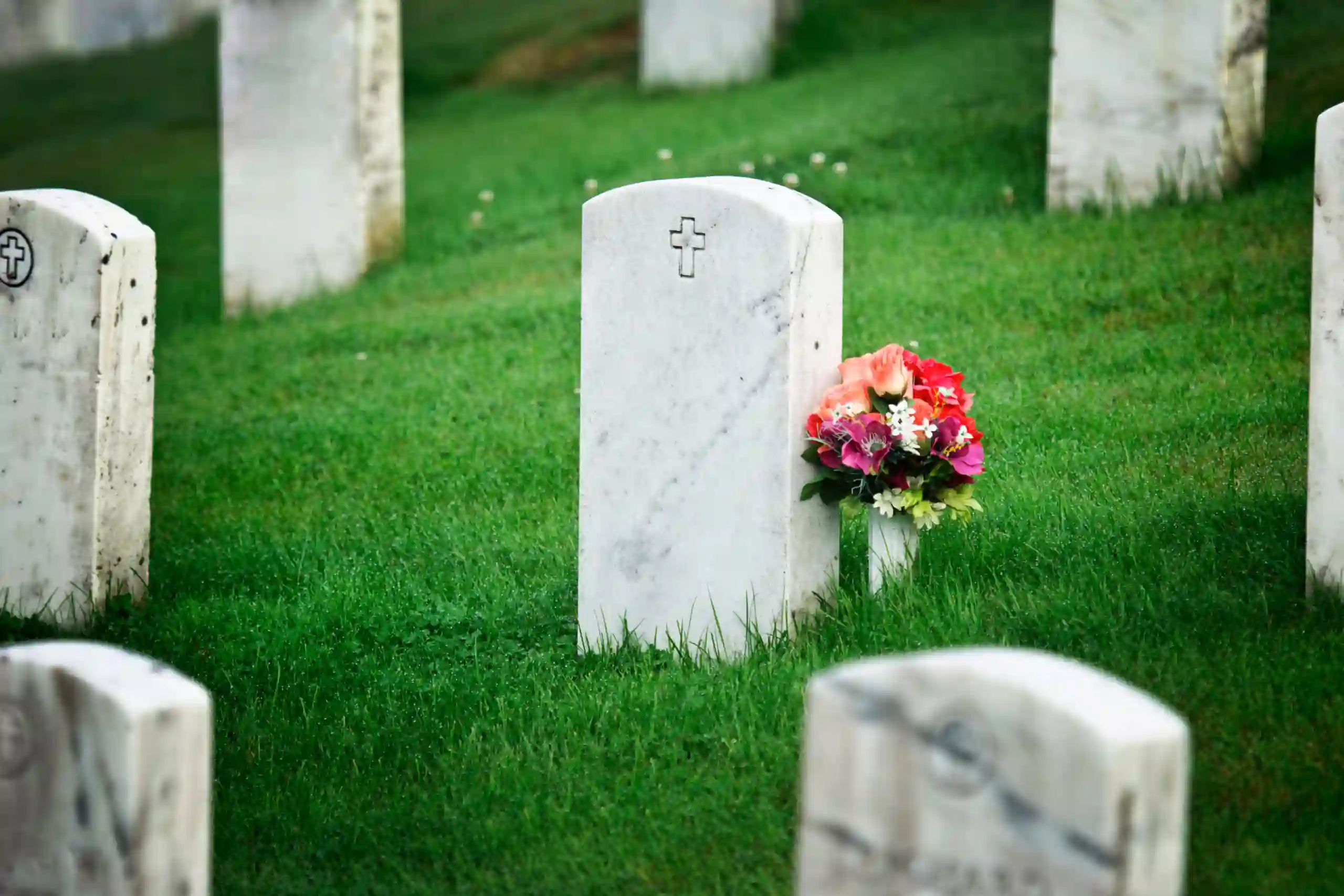 help with funeral costs. Picture of graveyard
